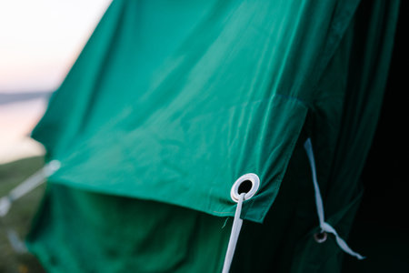 Details of a green camping tent, outdoor recreation