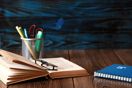 Back to school template on a blue board background, school concept