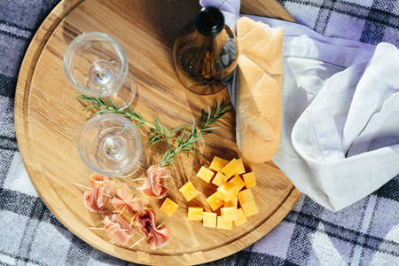 Delicious food and accessories outdoors in the summer or spring outing. Outdoor lunchの写真素材