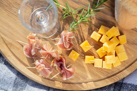 Delicious food and accessories outdoors in the summer or spring outing. Outdoor lunchの写真素材