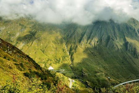 Slope road Switzerland Alps Mountainsの写真素材