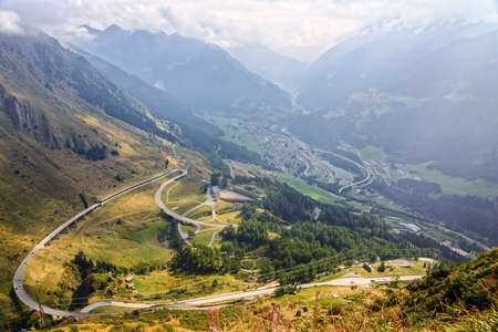 Switzerland Alps Mountains Ariolo fogの写真素材