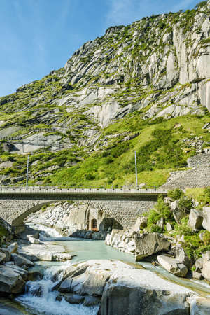Bridge stream Alps mountains Switzerlandの写真素材