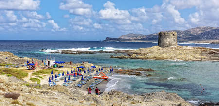 Parasol beach rocks stintinoの写真素材