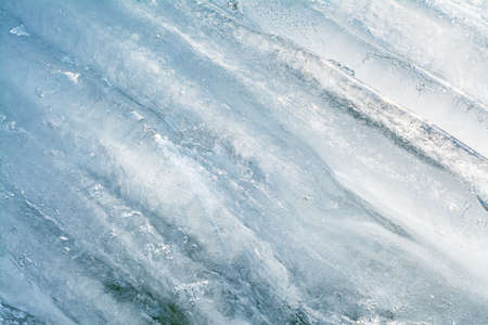 diagonal stripes and texture in a block of iceの写真素材
