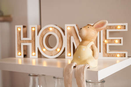 Easter bunny on a home text backgroundの写真素材