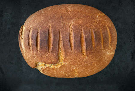 Homemade bread on a black tableの写真素材