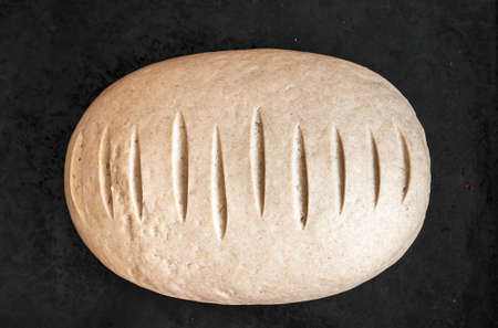 Homemade bread on a black tableの写真素材