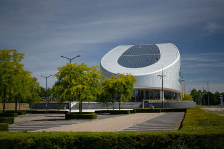 Sittard, Netherlands - 05.31.2020 SABIC European Head Office. Against the background of blue sky and the adjacent parking lot.のeditorial素材