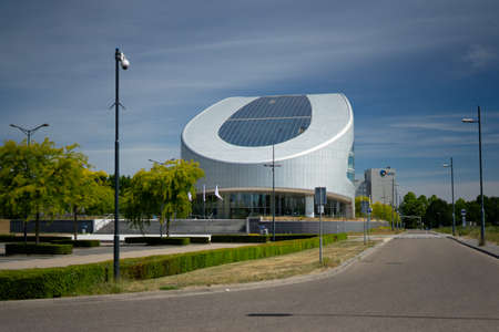 Sittard, Netherlands - 05.31.2020 SABIC European Head Office. Against the background of blue sky and the adjacent parking lot.のeditorial素材