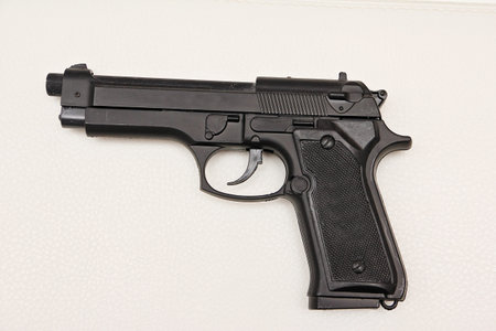 A copy of the gun black 9mm isolated white background.の写真素材