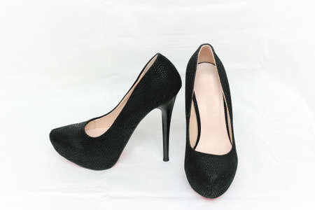 Female shoes with heels of black color isolated against white background.の写真素材