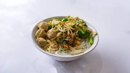 Indonesian meatball bakso served with soup and noodle