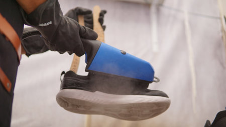 a shoe being washed using a scarpavapor steam cleanerの写真素材