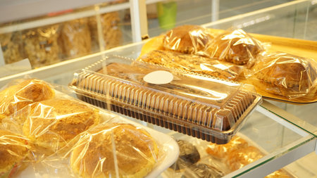 Bakery products in a bakery shop, close-up of photoの写真素材