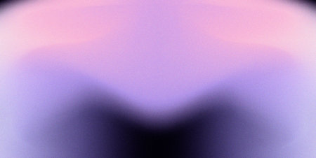 A soft, blurred background gradient transitions from pink to purple with a dark V-shape in the centerの写真素材