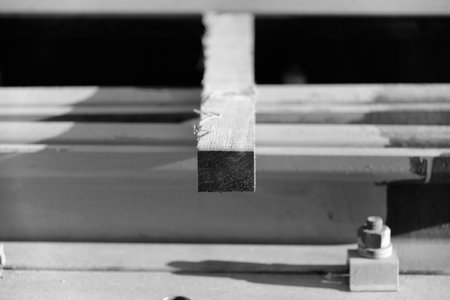 Wooden plank with splinters at construction siteの写真素材