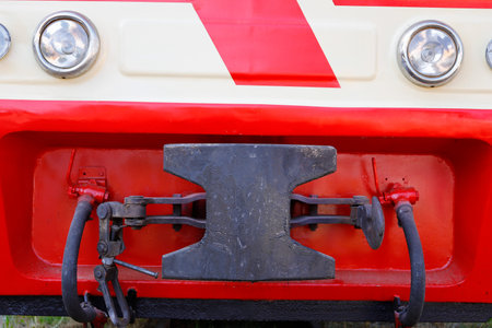 Black iron bumper on red locomotive