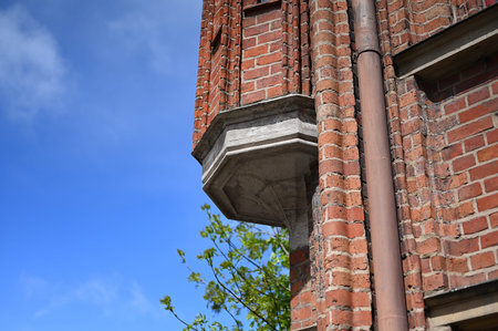 Red brick wall and the blue sky