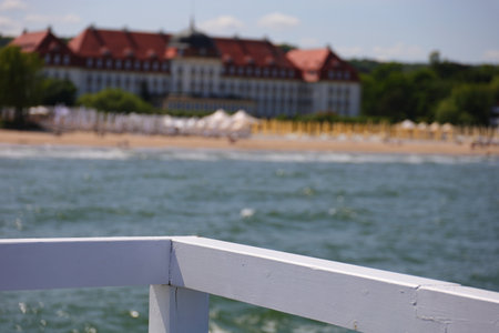 White balustrade on the bridge and the coast in the backgroundの写真素材