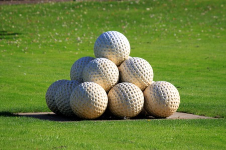 Pyramid of golf ballsの写真素材