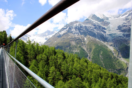 Suspension bridge in the Swiss mountainsの写真素材