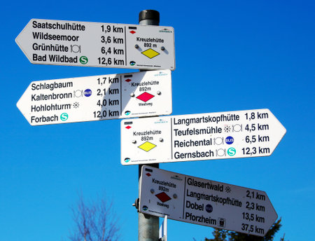Signpost with directions to different cities and towns in the French department of Gardの写真素材