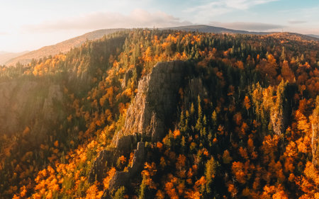 Aerial Autumn Fall Foliage Mountain Landscape in Dixville Notch New Hampshire. New England Wide Vista at Sunset. Green and Yellow Treesの写真素材