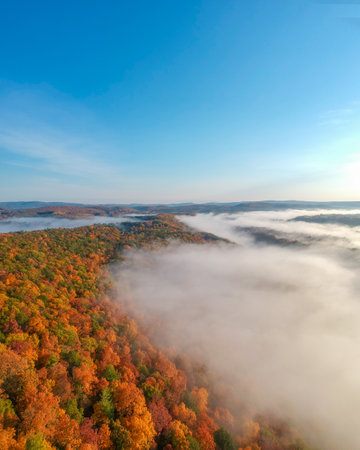 Poet's Seat Tower View Epic Sunrise New England Fall Foliage Aerial View. Low Fog Over Vast Colorful Forest Trees. Massachusetts. Beautiful Natureの写真素材
