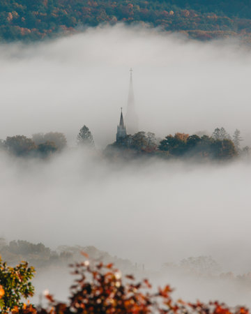 Small Town New England Fall Foliage Aerial View Dense Low Fog Clouds Forest Trees. Poet's Seat Tower View Massachusetts Drone. Beautiful Earlyの写真素材