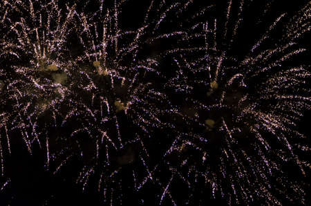 Fireworks in the night against black backgroundの写真素材