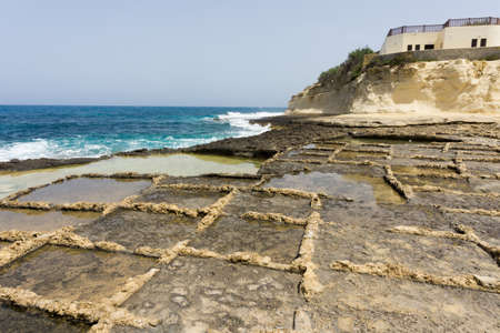 Salt evaporation ponds, called Salterns or Salt Pans, on the Maltese island of Gozoのeditorial素材