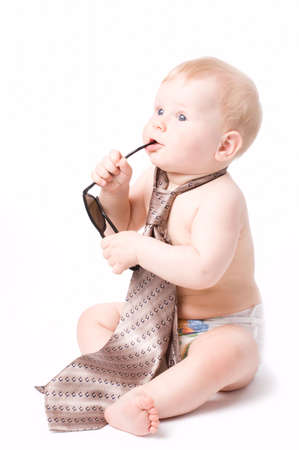 The small child in studio, on a white backgroundの写真素材