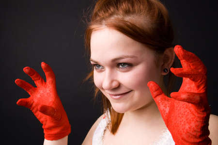 The charming young girl in studio on black backgroundの写真素材