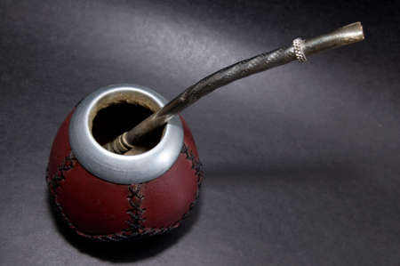 Cup from calabash with yerba mate tea and straw.の写真素材