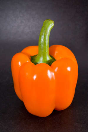 The red pepper on a black background.の写真素材