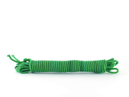 green Nylon rope isolated on white backgroundの写真素材