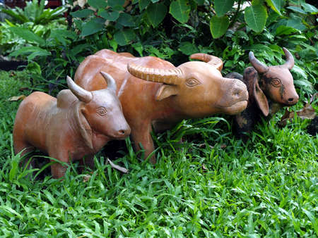 cow and buffalo, earthenware for garden decorationの写真素材