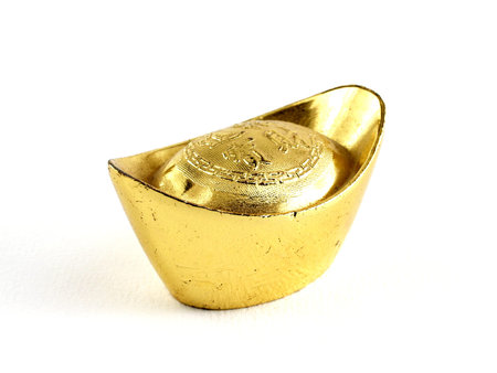 antique chinese gold ingot isolated on white background, the characters on gold ingot means making...