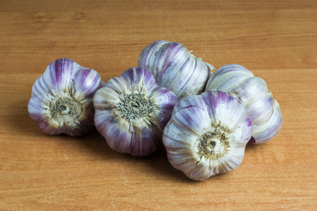 Garlic on the table. Polish, spice, additive.