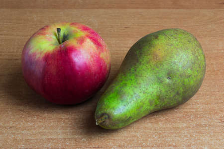 Apple and pear on the table. Healthy food.の写真素材