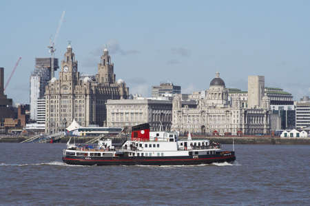 Pier head buildings in Liverpool from across the River Merseyの写真素材