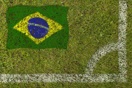 Flag of Brazil painted on football pitchの写真素材