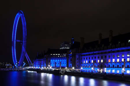 Tourists heading towards the London Eyeのeditorial素材