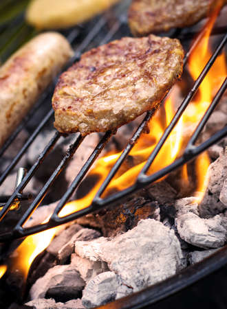 Meat cooking on a barbecue BBQ grillの写真素材