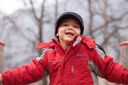 Happy boy on the playgroundの写真素材