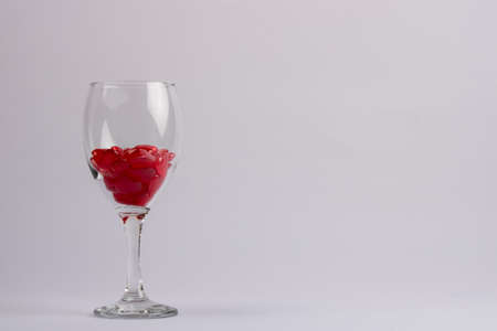 hearts in a tall wine glassの写真素材