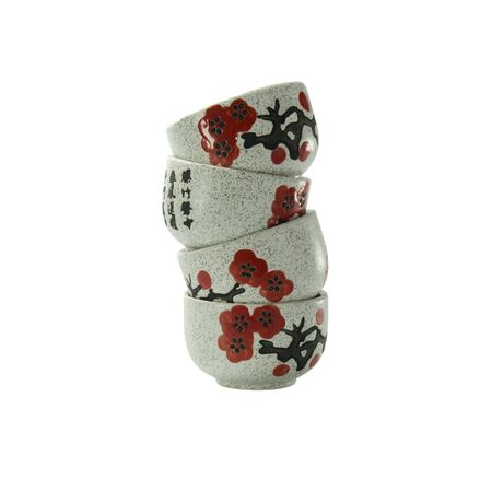some chinese tea cups on a white backgroundの写真素材
