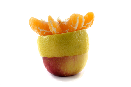 apple lemon and tangerine slices isolated on a white backgroundの写真素材