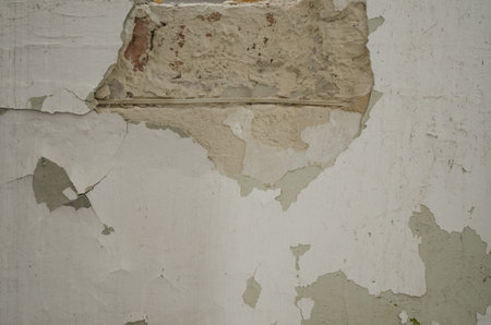 crack on the light wall texture close-up background